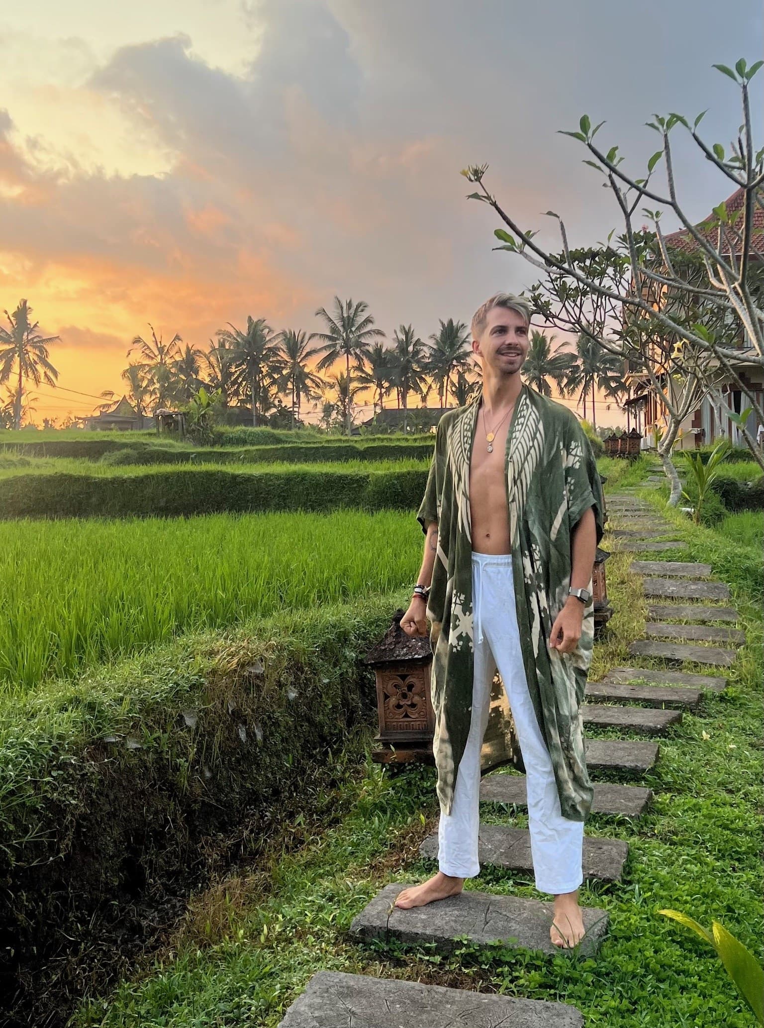Mike Mana standing in the rice fields of Bali