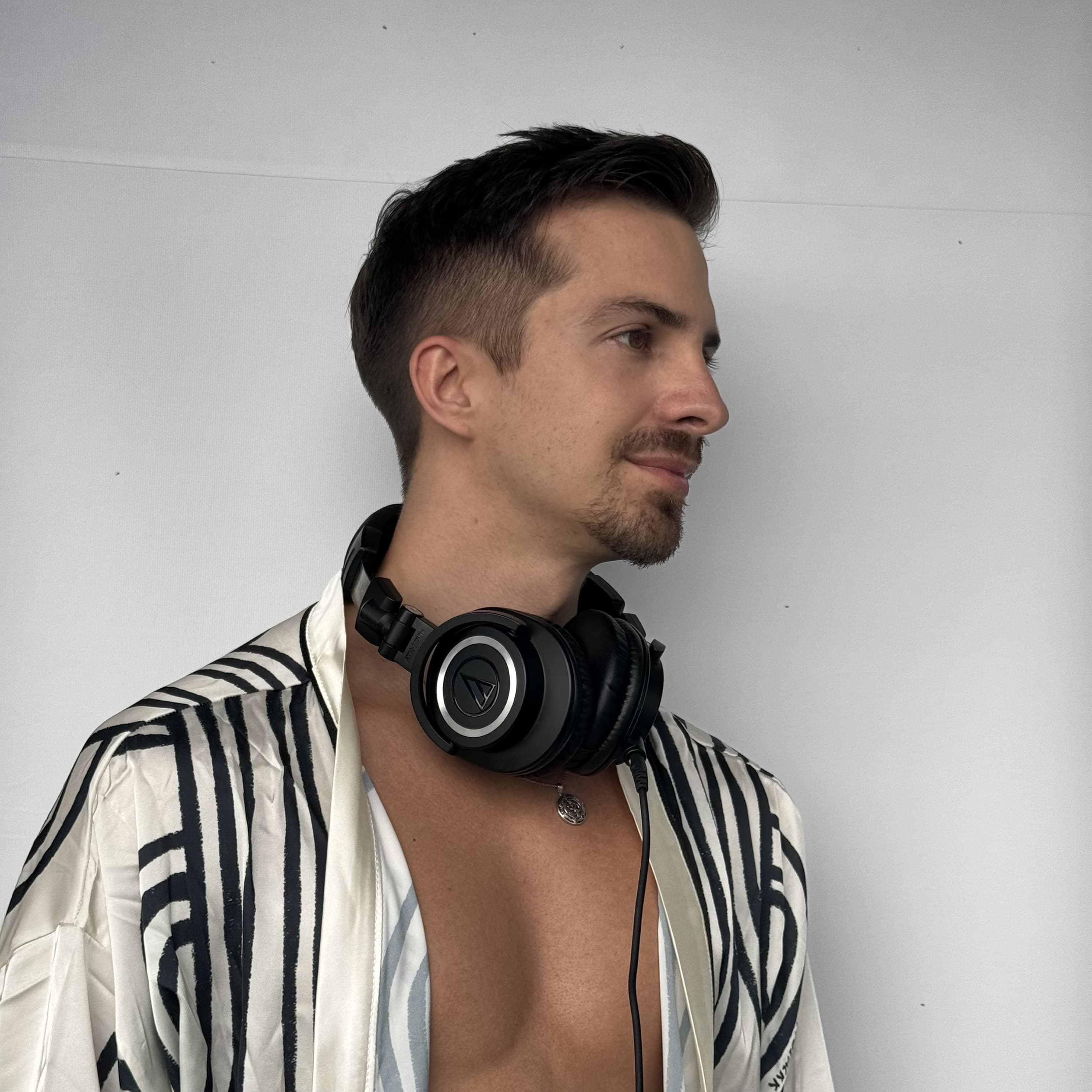 Headshot of Mike Mana in profile